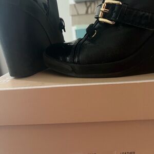Michael Kors leather wedge boot. size 8 fits 7.5 lace up bootie with gold buckle
